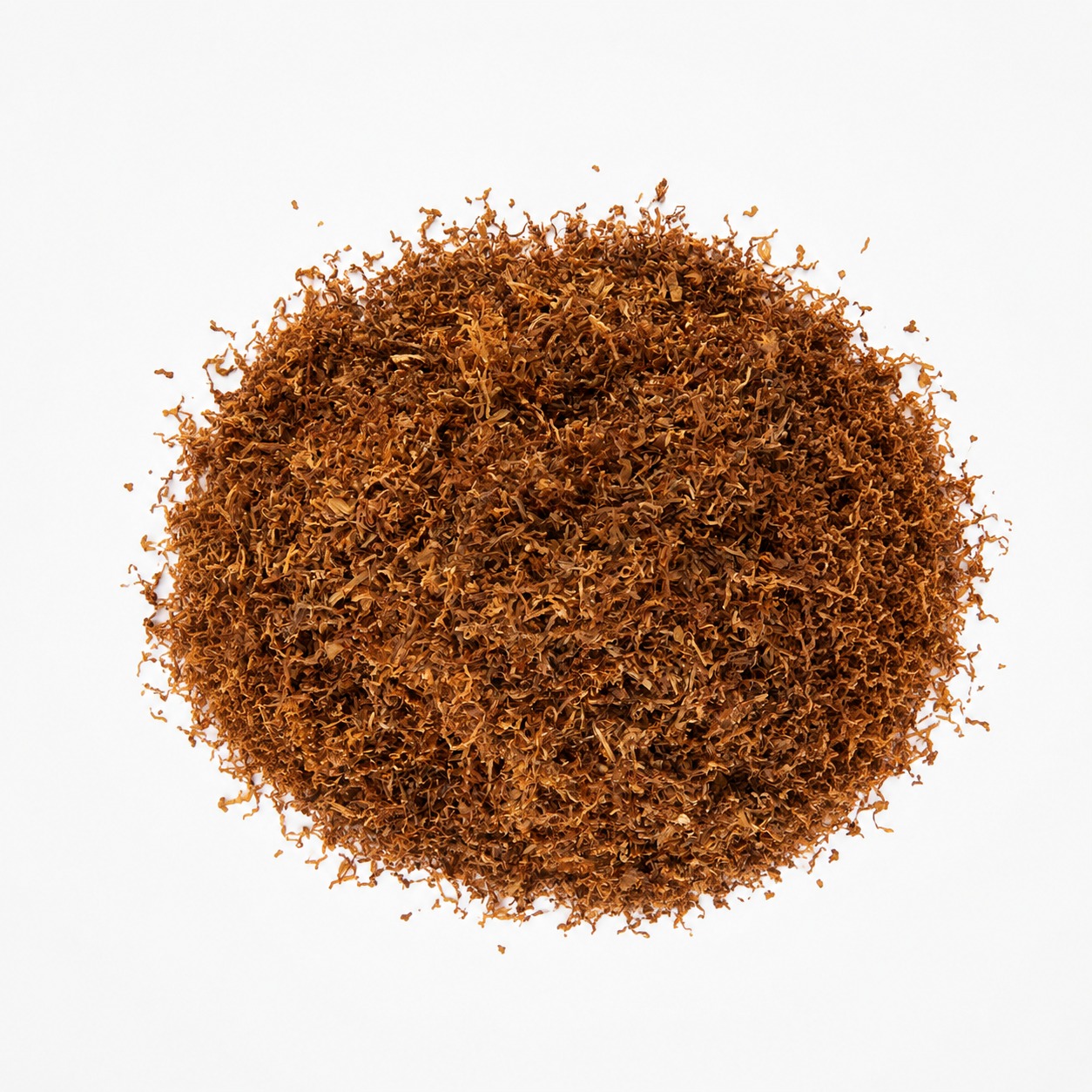 White plate of finely shredded golden cut rag tobacco